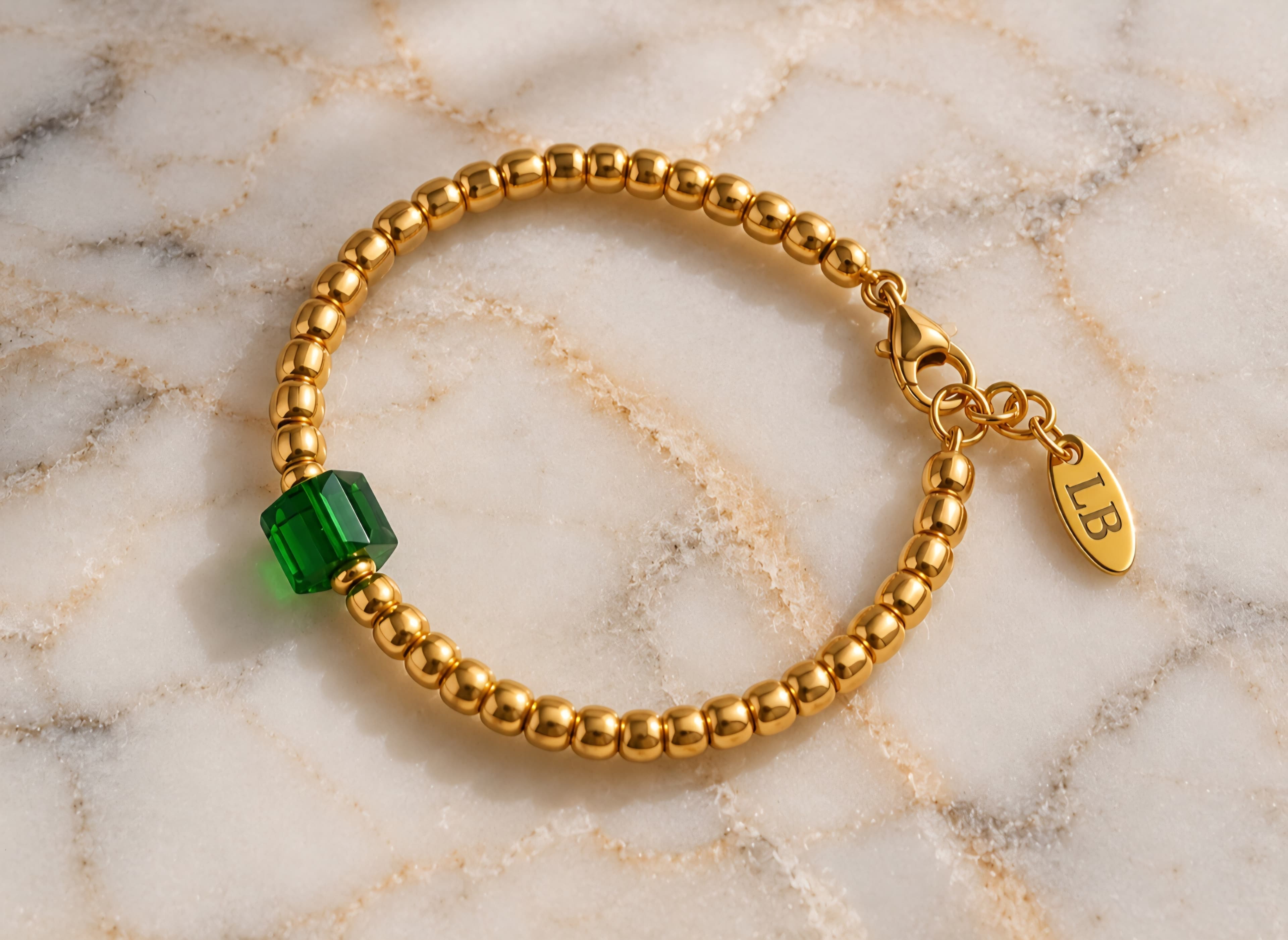 gold rocaille met groene facet 2